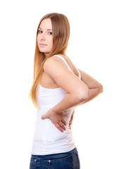 Attractive young woman suffers from backache. All on white background.