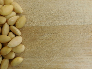 almonds to eat on wooden base