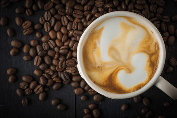 Cappuccino with  coffee beans top view