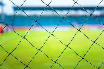 net behind of football or soccer field in the stadium.