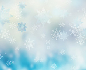 Naklejka na ściany i meble Winter snowy snowflakes blur background.