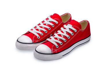 A pair of red gumshoes with shoelace