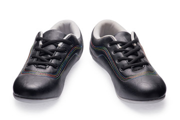 A pair of black sports shoes with shoelace