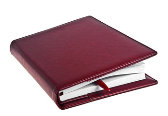 Leather notebook and pen on white background