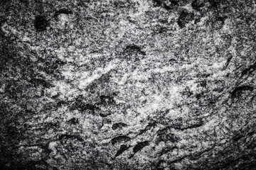 Fototapeta na wymiar The surface of natural stone as a natural background. Selective