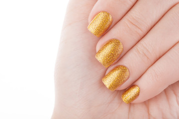 Beautiful golden manicure.