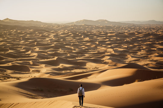 Man lost in desert dunes
