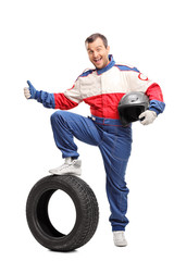 Excited car racer giving a thumb up © Ljupco Smokovski