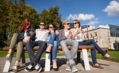 group of students or teenagers drinking coffee