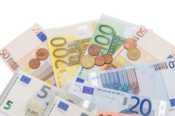 Euro banknotes and coins isolated