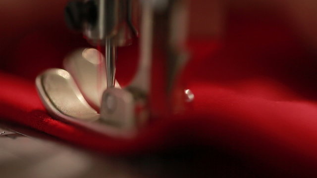 Sewing machine showing process. Close up.
