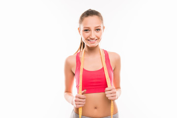 Sporty girl in tube top with measuring tape