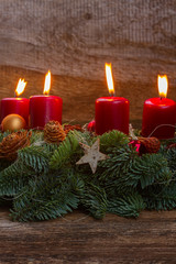 advent wreath with burning candles 