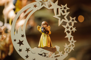 Fototapeta premium beautiful christmas angel in star hanging