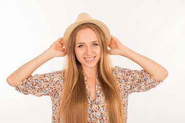 Portrait of nice smiling girl in a hat