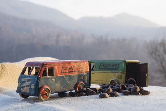 toy trucks carrying coffee beans
