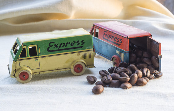 toy trucks carrying coffee beans