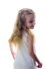 Young blonde little girl in white