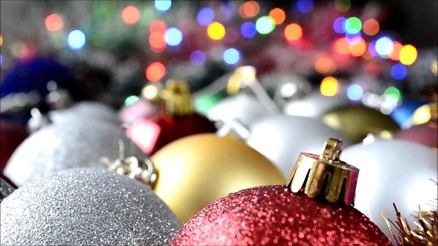 New year's toys - a balls on background blinking festoons