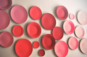 Colored plates on the wall  - toned picture