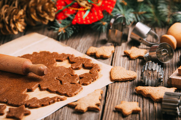 Christmas homemade gingerbread cookies on wooden table