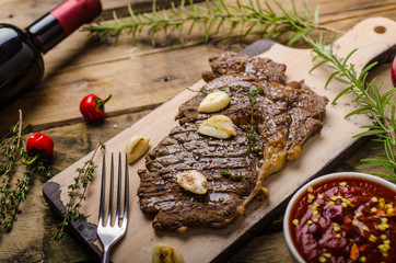 Rib eye steak with wine