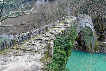 Traditional stone bridge in Epirus, Greece © dinosmichail
