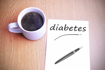 Coffee on the table with note writing writing diabetes