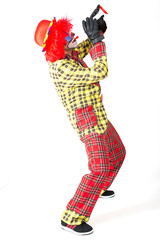 Clown spielt Trompete