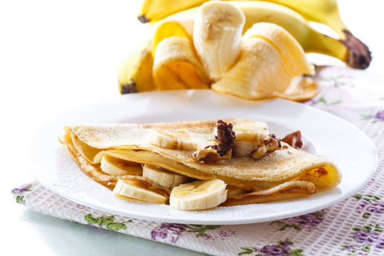 sweet pancakes with bananas and nuts 
