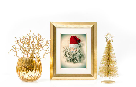 Golden frame and Christmas ornaments. Vintage style Santa Claus