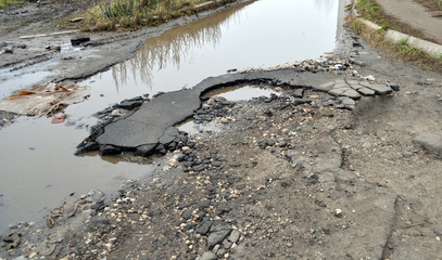 large pit with asphalt