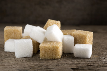 Cubes of sugar cane brown and white