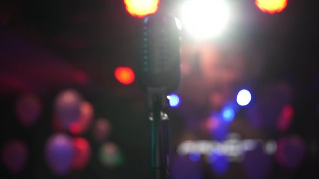 Microphone on stage. background karaoke hall in Rasfokus