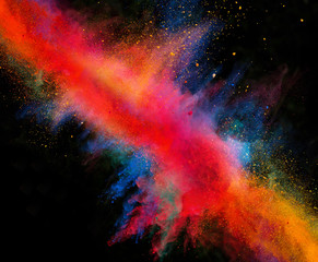 Launched colorful powder on black background