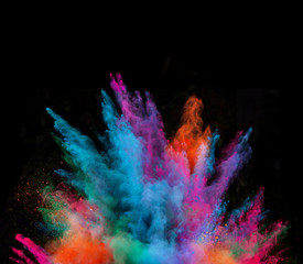 Launched colorful powder on black background