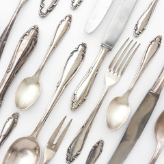 beautiful sterling cutlery collection on white background