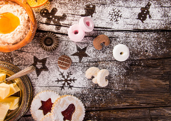 Christmas sweets over wooden background, close-up.