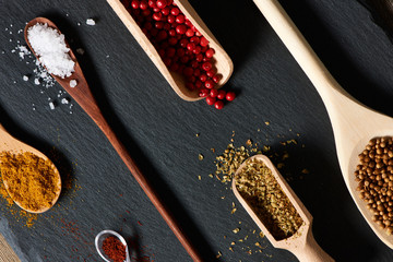 Spices in wooden utensils