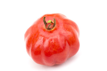 Brazilian pitanga fruit closeup on white