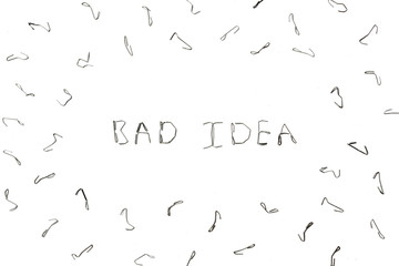 results of poor and corrupt stapler. Bent brackets in large numbers. Bad idea