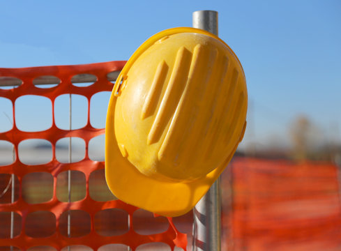 hard hat on the road construction site during road works and a s