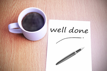 Coffee on the table with note writing well done