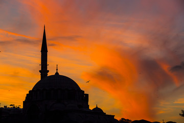 The old mosque and minaret at sunset in Istanbul