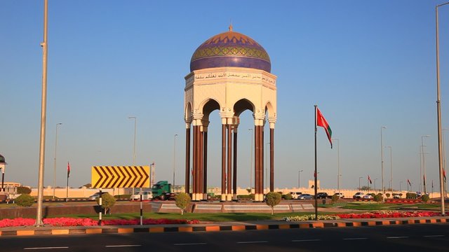 Roundabout with an oriental tower in the city of Muscat, Sultanate of Oman, Middle East