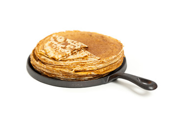 Pancakes or Russian Blintzes on white background. Selective focus.