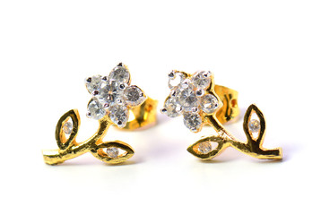 couple earrings on white background