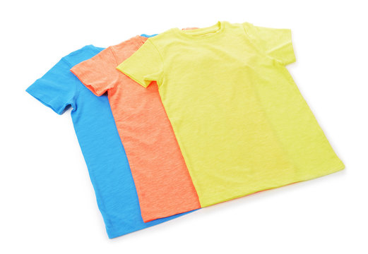 Colourful cotton T-shirt in a row isolated on white background