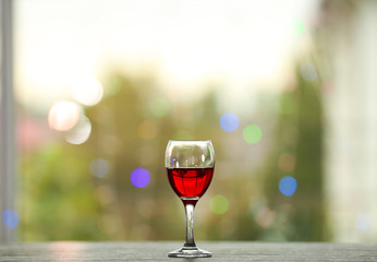 Wine glasses with wine on a table outside