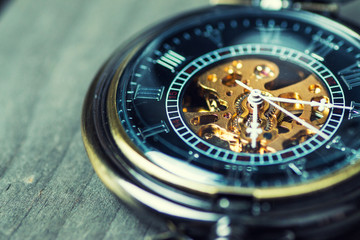 Close up of vintage pocket watch Showing Gears;time concept